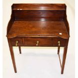 A GEORGE IV PERIOD MAHOGANY WASHSTAND, the three quarter gallery with a shelf, the top with an