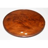 A 19TH CENTURY CIRCULAR MAHOGANY LAZY SUSAN, with reeded dish top raised on a pumpkin shaped