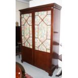 AN EDWARDIAN MAHOGANY WARDROBE IN THE GEORGE III STYLE, the moulded cornice above two astragal