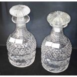 A PAIR OF CUTGLASS MALLET-SHAPED DECANTERS, with stoppers, 9.5'' (24cm). (2)