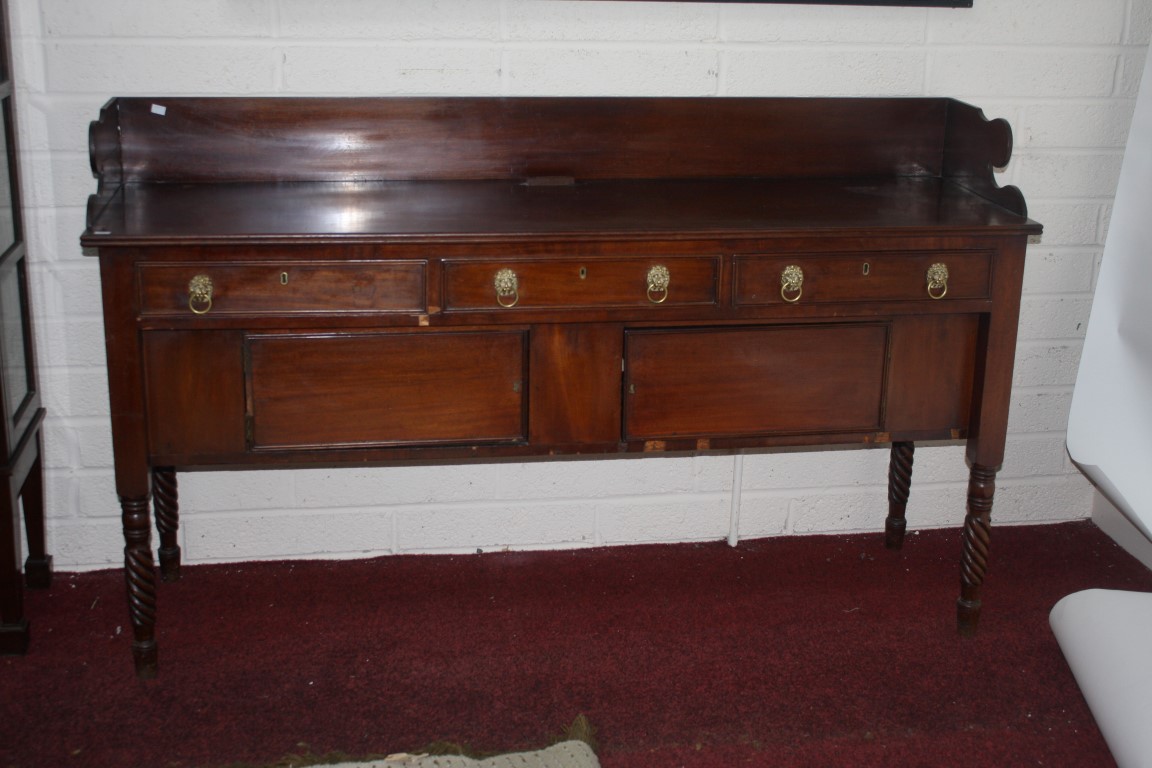 A 19th CENTURY MAHOGANY SIDEBOARD, with three quarter gallery above one mock and two frieze drawers,