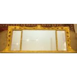 A 19TH CENTURY GILT THREE-COMPARTMENT OVERMANTEL MIRROR