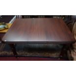 A SMALL VICTORIAN MAHOGANY DINING TABLE