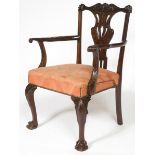 AN IRISH 19TH CENTURY CARVED MAHOGANY DINING ROOM ARMCHAIR