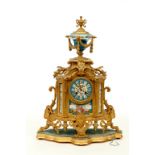 A LATE 19TH CENTURY FRENCH GILT-METAL MANTEL CLOCK