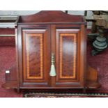 AN EDWARDIAN INLAID TWO-DOOR HANGING WALL CUPBOARD