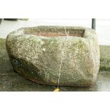 A VERY LARGE HEAVY CUT-GRANITE TROUGH