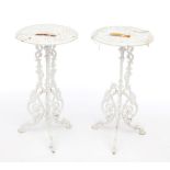 A PAIR OF PIERCED CAST-METAL PATIO TABLES OR JARDINIERE STANDS