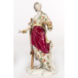 A GERMAN PORCELAIN FIGURE