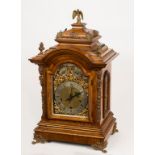 A LARGE VICTORIAN WALNUT-CASED CHIMING BRACKET CLOCK