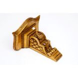 A CARVED GILTWOOD WALL BRACKET