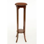 A TALL MAHOGANY TWO-TIER JARDINIERE