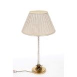 A BRASS AND GLASS TABLE LAMP,