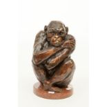 A BRONZE FIGURE OF A CHIMPANZEE