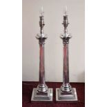 A PAIR OF SILVER-PLATE CORINTHIAN STYLE TABLE LAMPS