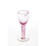 A LARGE PINK GLASS GOBLET
