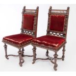 A PAIR OF CARVED OAK SIDE CHAIRS
