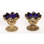 A GOOD PAIR OF WILLIAM IV SILVER AND SILVER-GILT GOTHIC STYLE STEMMED SALTS