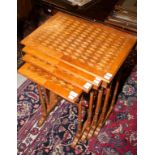 A NEST OF FOUR RECTANGULAR PARQUETRY OCCASIONAL TABLES