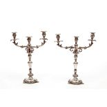 A PAIR OF 19TH CENTURY SHEFFIELD SILVER-PLATE TWO-BRANCH THREE-LIGHT CANDELABRA