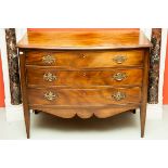 AN EDWARDIAN MAHOGANY BOW FRONTED CHEST