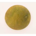 A CIRCULAR CHINESE GREEN JADE DISC