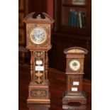 A FINE QUALITY MINIATURE ROSEWOOD AND FLORAL MARQUETRY LONGCASE CLOCK