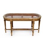 A FRENCH GILT STOOL