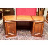 AN UNUSUAL MAHOGANY OFFICE DESK