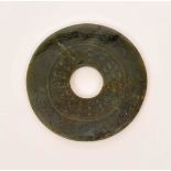 AN EARLY CHINESE JADE BI-DISC