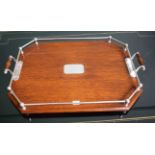 AN OCTAGONAL OAK TRAY