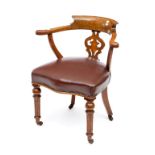 A VICTORIAN OAK DESK CHAIR