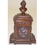 A CARVED FRENCH WALNUT-CASED BRACKET CLOCK