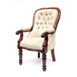 A FINE VICTORIAN MAHOGANY AND BUTTON-BACK LIBRARY ARMCHAIR