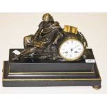 A RECTANGULAR BLACK POLISHED LIMESTONE FRENCH MANTEL CLOCK