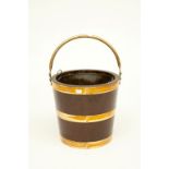 A BRASS BOUND AND COOPERED WOODEN PEAT BUCKET