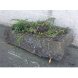 A LARGE RECTANGULAR CUT-GRANITE TROUGH