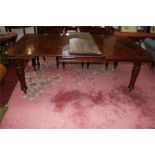 A LATE VICTORIAN TELESCOPIC MAHOGANY DINING TABLE