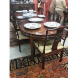 A NINE-PIECE CHINESE CHERRYWOOD SUITE OF DINING ROOM FURNITURE