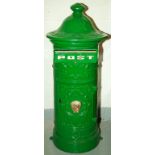 A HEAVY CAST IRON AND RELIEF MOULDED POST BOX