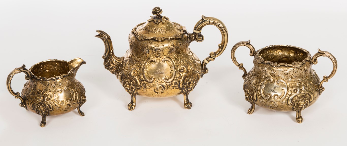 AN ATTRACTIVE THREE-PIECE VICTORIAN SILVER-GILT TEA SERVICE