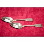 A PAIR OF GEORGE IV SILVER FIDDLE PATTERN AND CRESTED TABLE SPOONS
