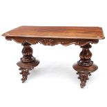 A VICTORIAN ROSEWOOD LIBRARY OR SOFA TABLE
