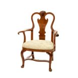 A FINE 18TH CENTURY IRISH RED WALNUT ARM CHAIR