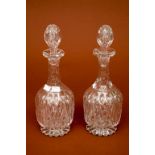 A PAIR OF LATE 19TH CENTURY CUT GLASS WINE DECANTERS