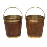 A PAIR OF IRISH GEORGIAN STYLE MAHOGANY PEAT BUCKETS