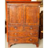 A WILLIAM IV MAHOGANY GENTLEMAN'S LINEN CUPBOARD-ON-CHEST