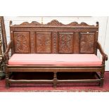 A 17TH CENTURY STYLE OAK SETTEE