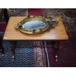 A REGENCY STYLE MAHOGANY TABLE