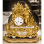 A FRENCH GILT METAL AND ONYX MANTEL CLOCK